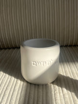 נטלה מבטון בעבודת יד
